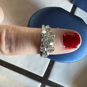 Wedding band set. Solitaire and Leo diamond jacket. Bought from Kay’s Jewelers.